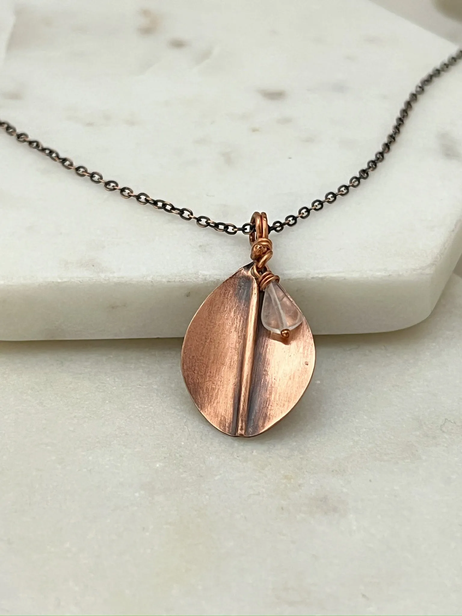 Hand forged copper leaf necklace with moonstone gemstone